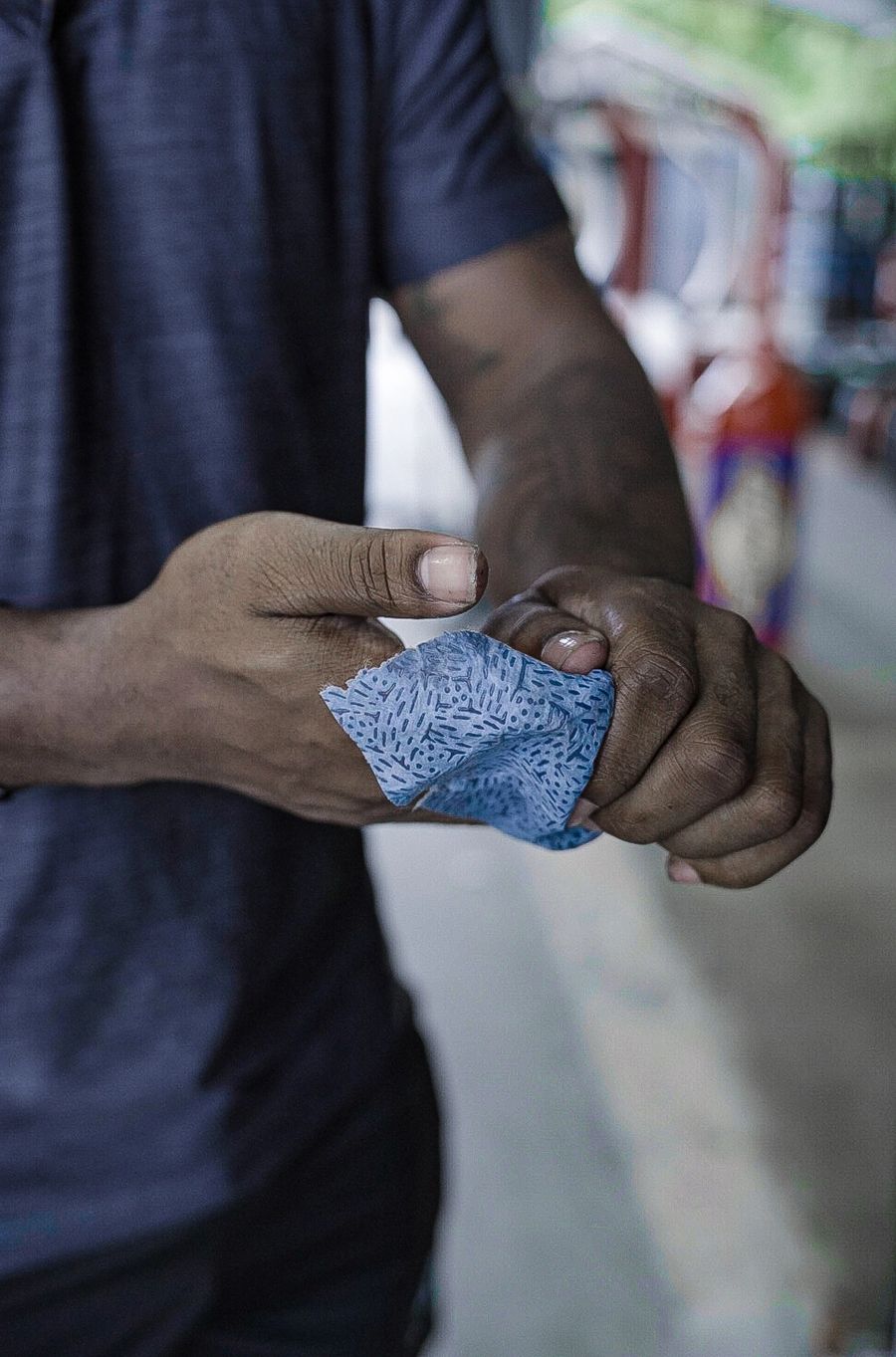 Brute Strength Wipes cleaning working hands in an industrial setting